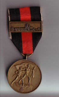 Medalla con el pasador de Praga