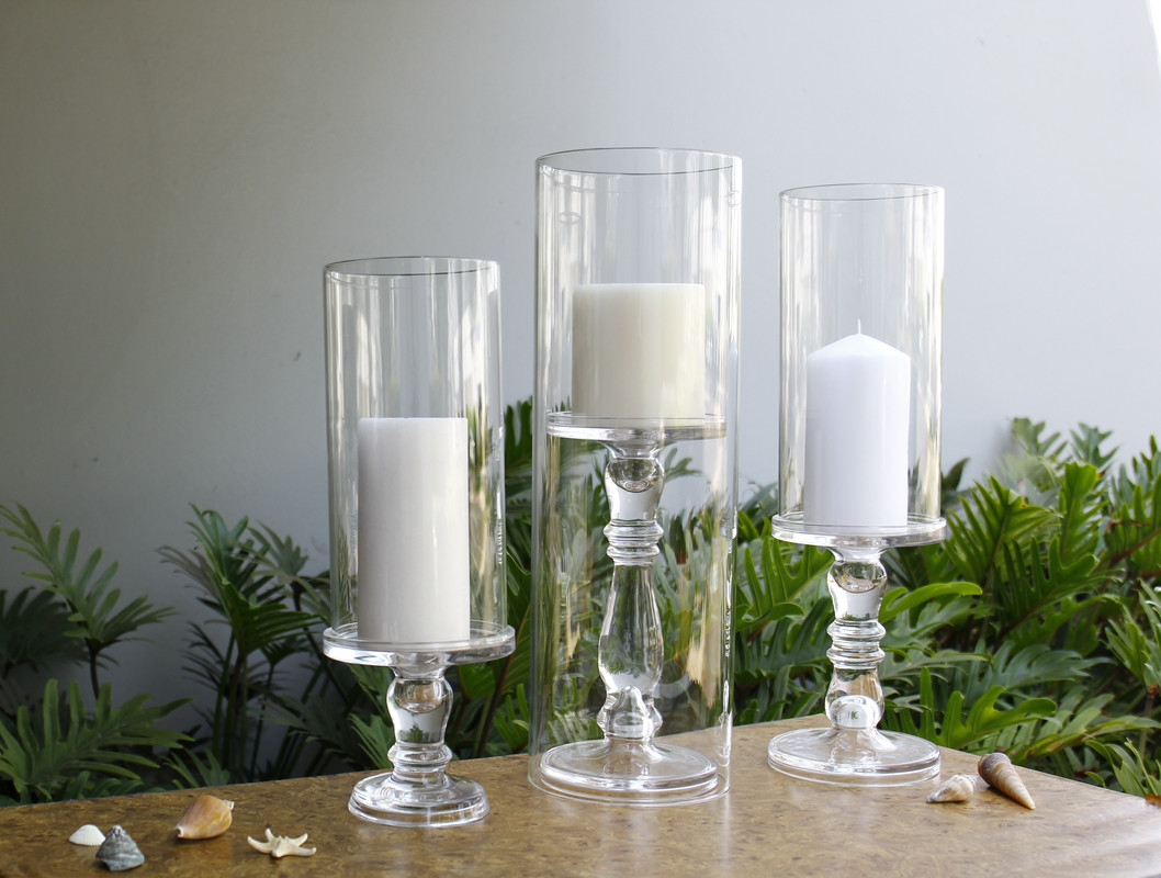 Hurricane candle shades are fantastic supplemental accents to these baluster stem candlesticks