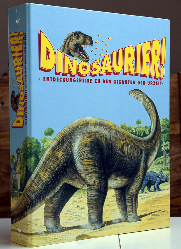 A binder featuring a large dinosaur, with the text DINOSAURIER! printed at the top.